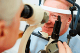 Opthalmologist testing a patient