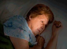 Worried Woman In Bed